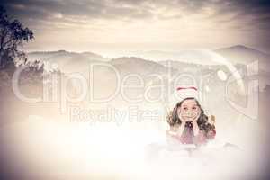 Composite image of festive child in snow globe