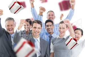 Composite image of business people cheering in office