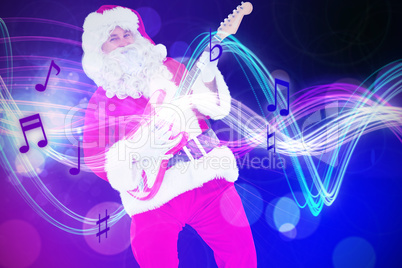 Composite image of smiling santa playing electric guitar