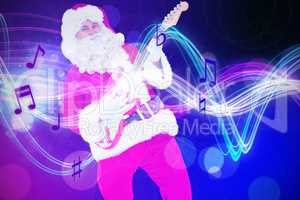 Composite image of smiling santa playing electric guitar
