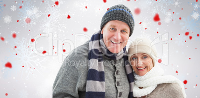 Composite image of mature winter couple