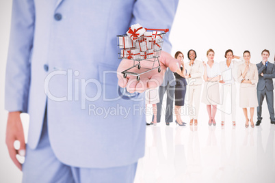 Composite image of handsome businessman gesturing with hands