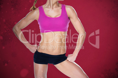 Composite image of female bodybuilder posing in pink sports bra