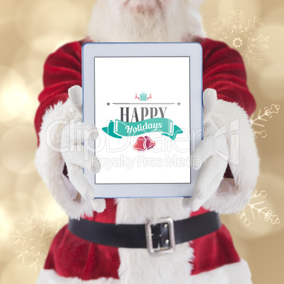 Composite image of santa presents a tablet pc