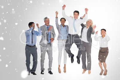 Composite image of business people cheering in office