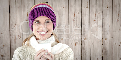 Composite image of glowing woman wearing a white pullover and a