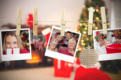 Composite image of christmas photos on a line