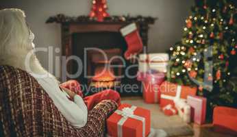 Santa claus sitting on the armchair