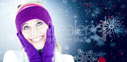 Composite image of cheerful young woman with cap and gloves in t