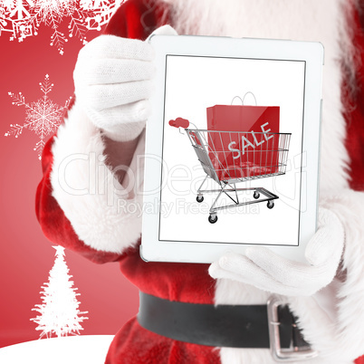 Composite image of santa claus showing tablet pc