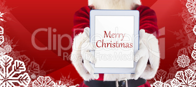 Composite image of santa presents a tablet pc