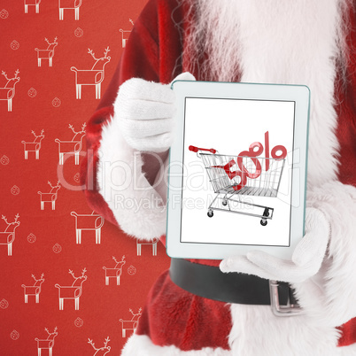 Composite image of santa presents a tablet pc