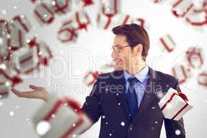 Composite image of businessman with empty hand open