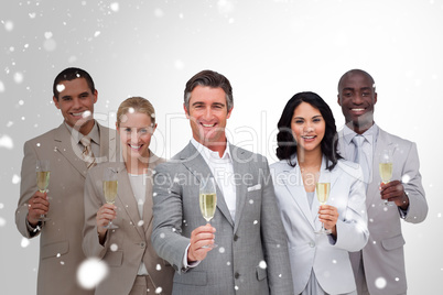 Composite image of business team celebrating a success with cham