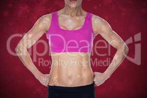 Composite image of female bodybuilder posing in pink sports bra