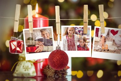 Composite image of hanging christmas photos