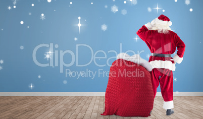 Composite image of santa with sack of gifts Composite image of santa with sack of gifts