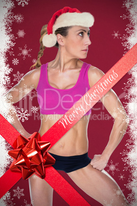 Composite image of female bodybuilder posing in sports bra and s