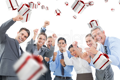 Composite image of business people cheering in office