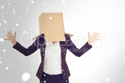 Composite image of anonymous businesswoman with her hands up