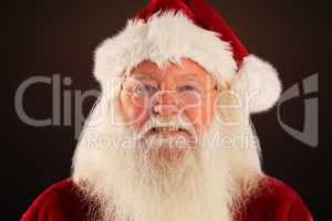 Composite image of santa smiles in the camera