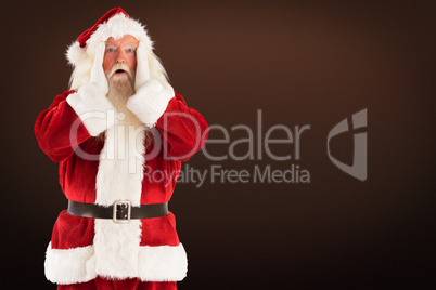 Composite image of santa is shocked to camera