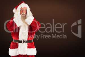 Composite image of santa is shocked to camera