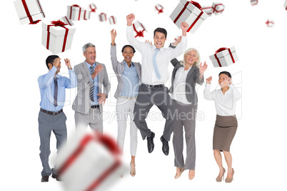 Composite image of business people cheering in office