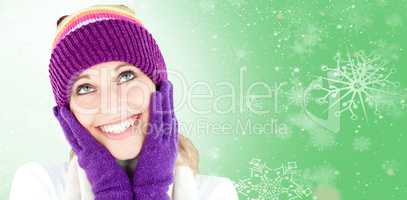 Composite image of cheerful young woman with cap and gloves in t