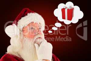 Composite image of santa is thinking about something