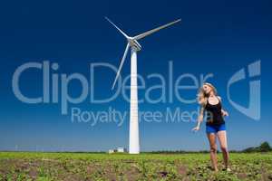 Female at wind power generator