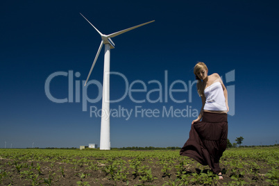 Female at wind power generator