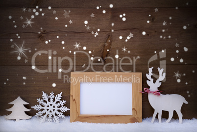 White Christmas Decoration On Snow, Copy Space, Sparkling Stars