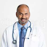 Mature Indian doctor smiling