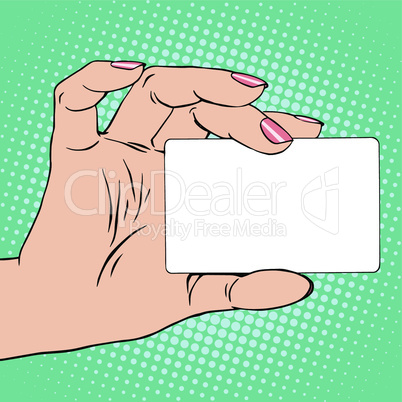Business card or credit card in female hand