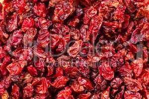 Dried red Tibetan spicy barberries placer background
