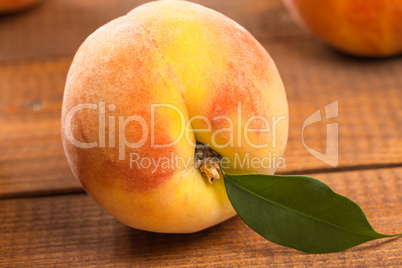 Peach on wood background