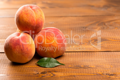 Peach on wood background