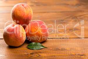 Peach on wood background