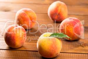 Peach on wood background