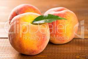 Peach on wood background