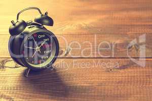 Alarm Clock On Wood Table