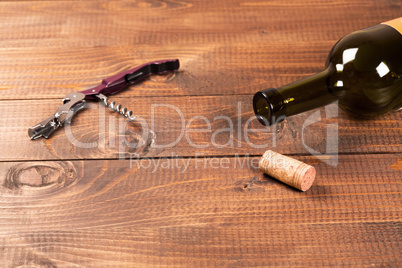 Bottle of red wine and corks.
