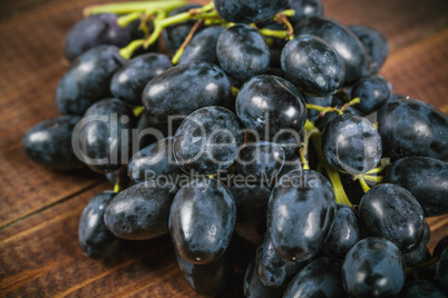 Grapes on a old wooden table.