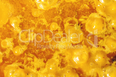 background of the oil in a soup. macro