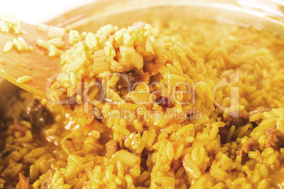 Traditional spicy food called pilaf cooked with fried lamb, rice