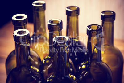 Closeup of empty bottles of wine