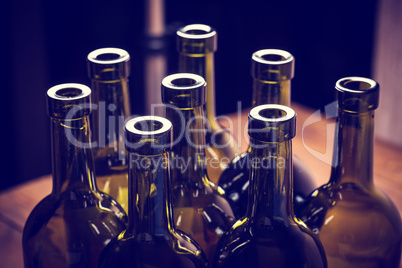 Closeup of empty bottles of wine