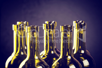 Closeup of empty bottles of wine