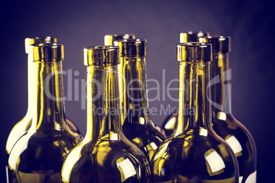 Closeup of empty bottles of wine